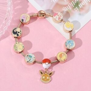 Pokémon Eevee & Evolutions Gold Charm Bracelet Pokéball Edition
